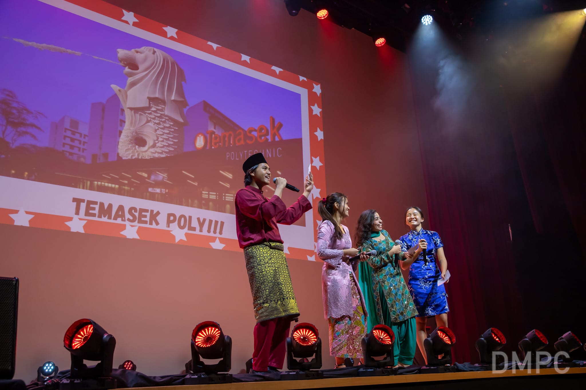 Image of TP Emcees on stage hosting the TP National Day Concert